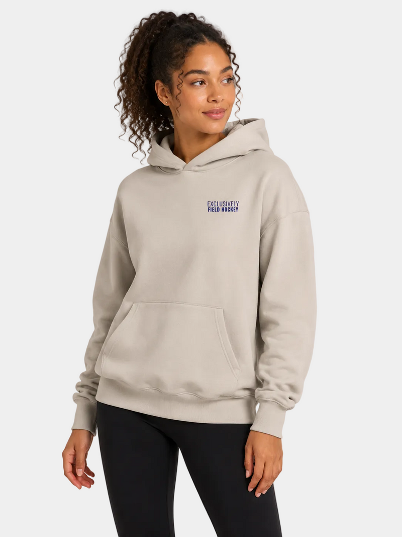 Women's field hockey ultra heavyweight hoodie in Ivory with embroidered Exclusively Field Hockey logo. Premium oversized fleece hoodie for field hockey players, training, tournaments, and everyday wear.
