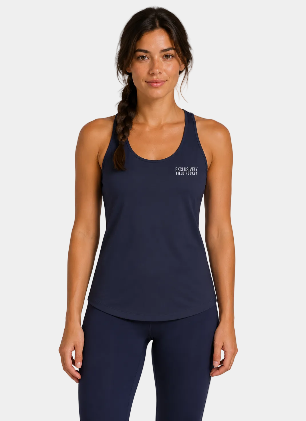 Women's field hockey racerback tank in True Navy featuring embroidered Exclusively Field Hockey logo. Lightweight moisture-wicking performance tank for field hockey forwards, midfielders, defenders, and athletes.