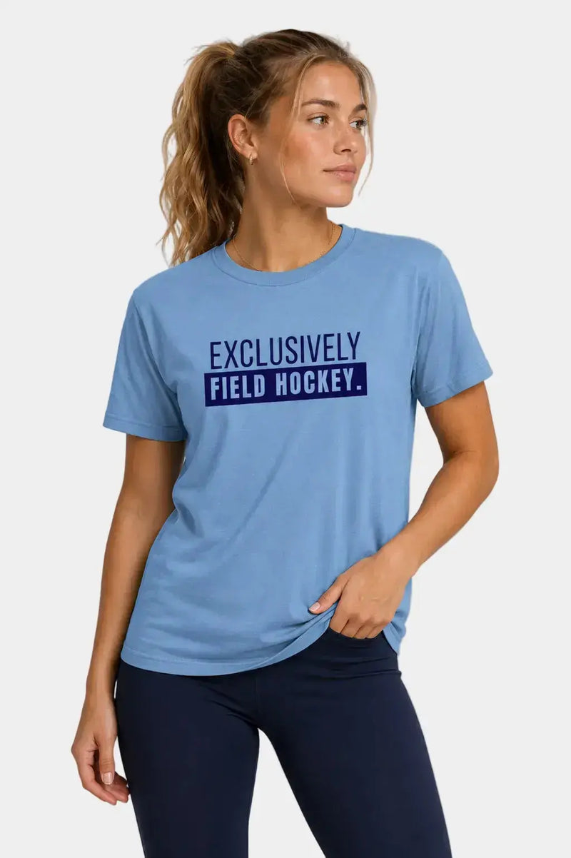 Field hockey player wearing blue Exclusively Field Hockey T-shirt