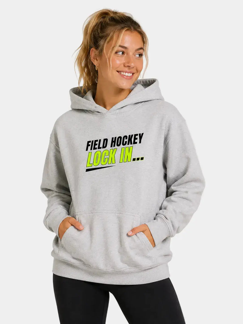 Field hockey player wearing Field Hockey Lock In Heavyweight Hoodie 